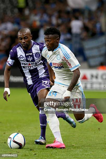 Georges Kevin Nkoudou for Olympique de Marseille and Jean Daniel Akpa Akpro during the French Ligue 1 game between Toulouse FC and Olympique de...