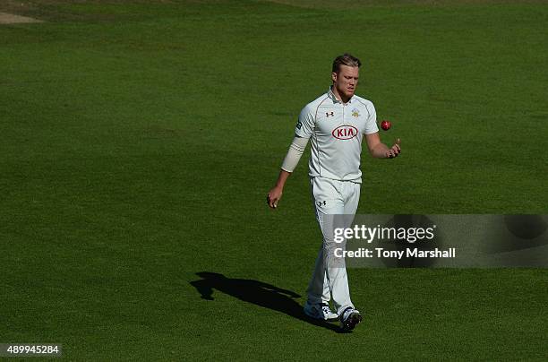 Matt Dunn of Surrey prepares to bowl during the LV County Championship - Division Two match between Surrey and Northamptoshire at The Kia Oval on...