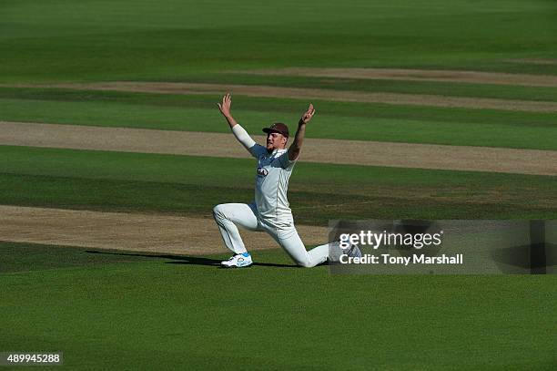 Matt Dunn of Surrey stretches during the LV County Championship - Division Two match between Surrey and Northamptoshire at The Kia Oval on September...