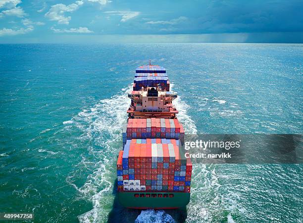 aerial view of freight ship with cargo containers - boats and ships bildbanksfoton och bilder