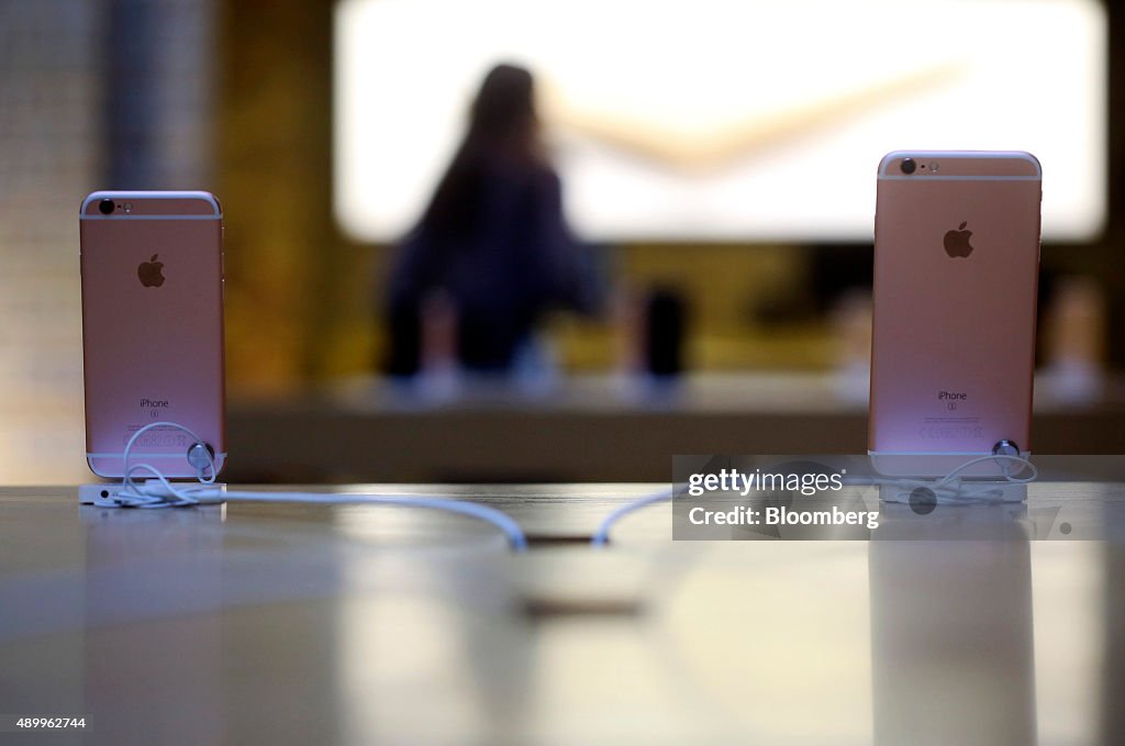Apple's New IPhone Hits Stores As CEO Faces Growth Questions