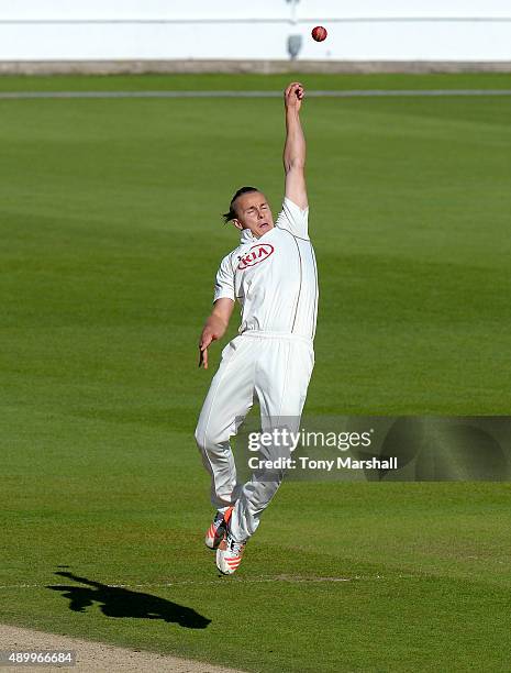 Tom Curran of Surrey stretches to catch a shot from Josh Cobb of Northamptonshire during the LV County Championship - Division Two match between...