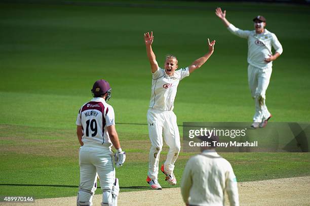 Tom Curran of Surrey makes an unsuccessful appeal for the wicket of Adam Rossington of Northamptonshire during the LV County Championship - Division...