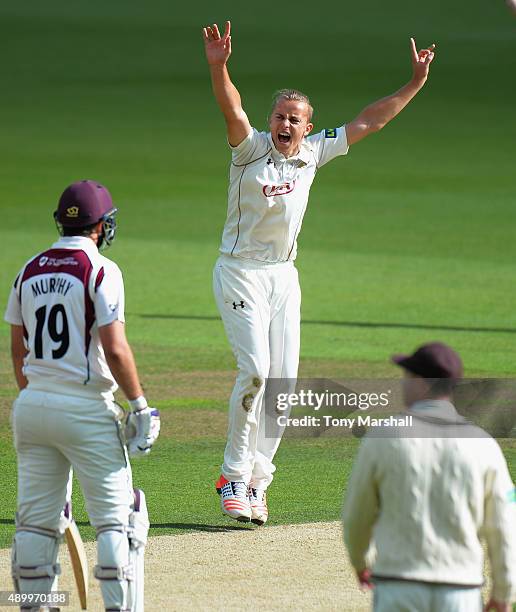 Tom Curran of Surrey makes an unsuccessful appeal for the wicket of Adam Rossington of Northamptonshire during the LV County Championship - Division...