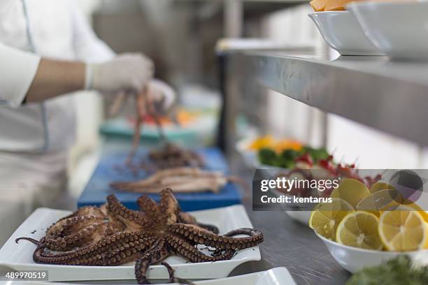 cooking octopus - kentarus stock pictures, royalty-free photos & images