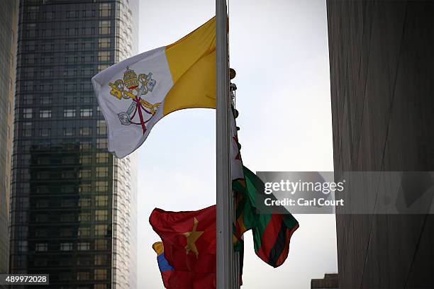 The Vatican flag flies outside the United Nations headquarters on September 25, 2015 in New York City. Pope Francis is in New York on a two day visit...