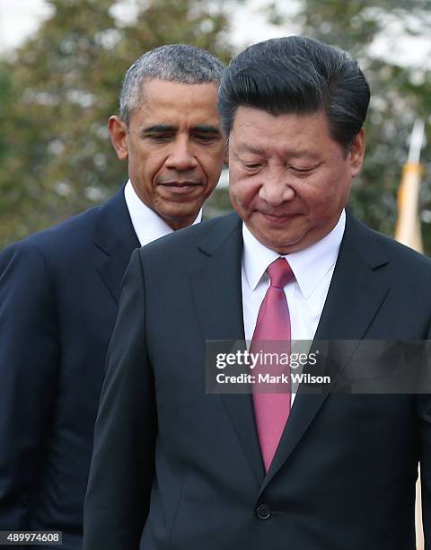 President Barack Obama and Chinese president Xi Jinping stand together during arrival ceremony at the White House September 25, 2015 in Washington,...