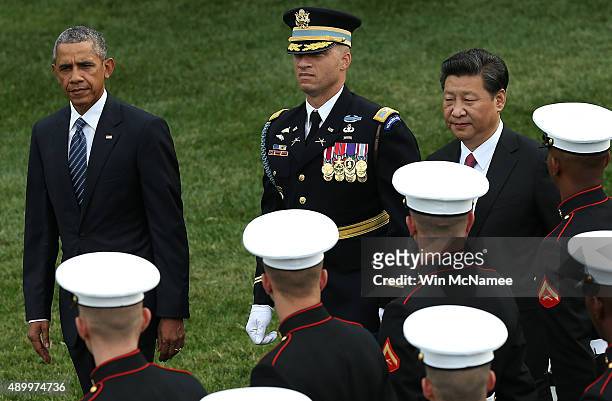 President Barack Obama and Chinese President Xi Jinping review U.S. Troops during a state arrival ceremony on the south lawn of the White House...
