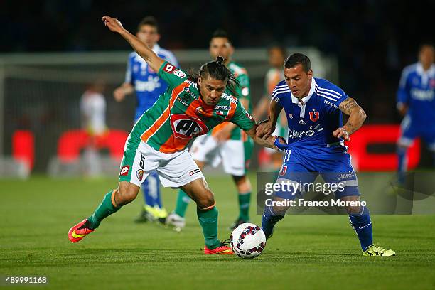 Sebastian Ubilla of U de Chile fights for the ball with Alexis Salazar of Cobresal during a match between U de Chile and Cobresal as part of 7th...