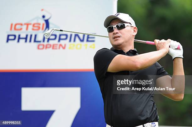 Angelo Que of Philippines plays a shot during practice ahead of the ICTSI Philippine Open at Wack Wack Golf and Country Club on May 13, 2014 in...