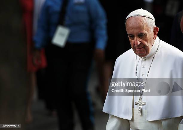 Pope Francis exits the Ground Zero memorial grounds on September 25, 2015 in New York City. Pope Francis visited Ground Zero following his address at...
