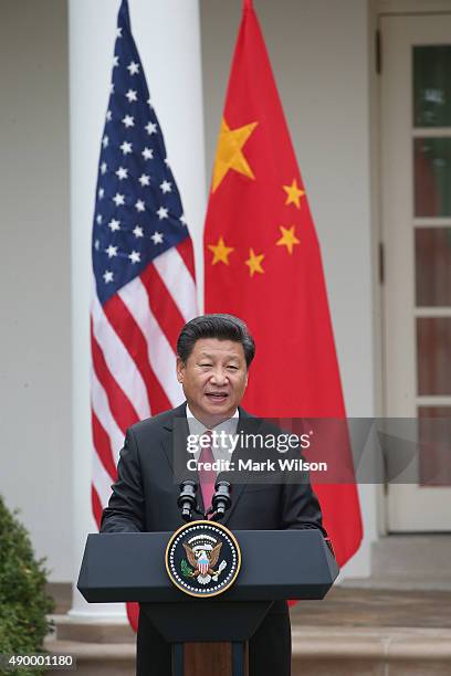 Chinese President Xi Jinping speaks at a joint press conference with U.S. President Barack Obama in the Rose Garden at The White House on September...