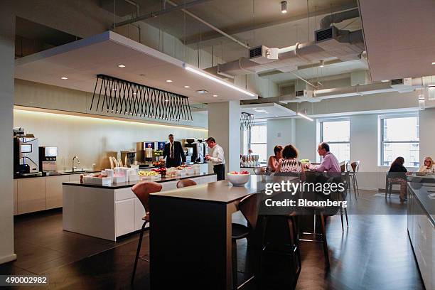 Employees have lunch in the cafeteria of the New York Stock Exchange in New York, U.S., on on Wednesday, Aug. 26, 2015. Many of Wall Street's biggest...