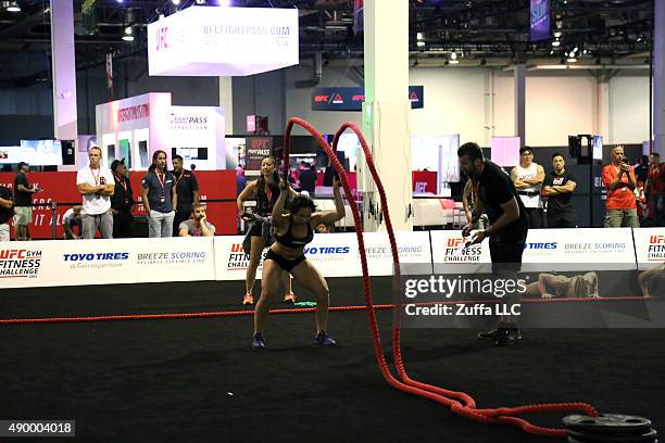 Fans participate in the uff fit Challenge at the UFC Fan Expo in the Sands Expo and Convention Center on July 10, 2015 in Las Vegas Nevada.