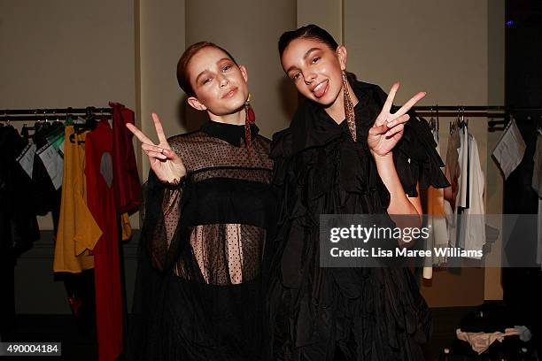 Models Jessica Thomas and Lucy Markovic prepare backstage ahead of the Australian Luxe show during Mercedes-Benz Fashion Festival Sydney 2015 at...