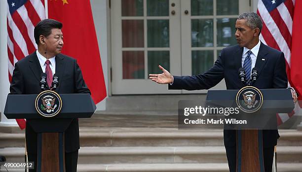 President Barack Obama speaks next to Chinese President Xi Jinping during a joint press conference in the Rose Garden at The White House on September...