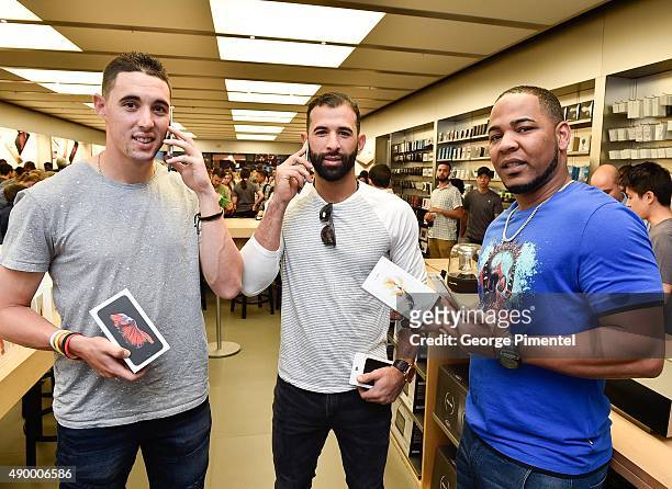 Toronto Blue Jays players Aaron Sanchez, Jose Bautista and Edwin Encarnacion stop by Apple Store Eaton Centre in Toronto for new iPhone 6s and iPhone...