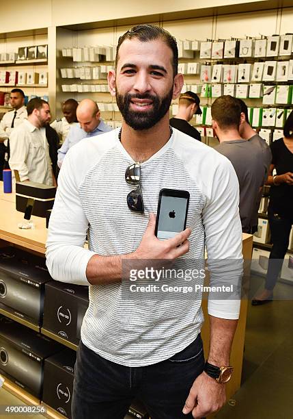 Toronto Blue Jays player Jose Bautista stops by Apple Store Eaton Centre in Toronto for new iPhone 6s and iPhone 6s Plus at Apple Store Eaton Centre...