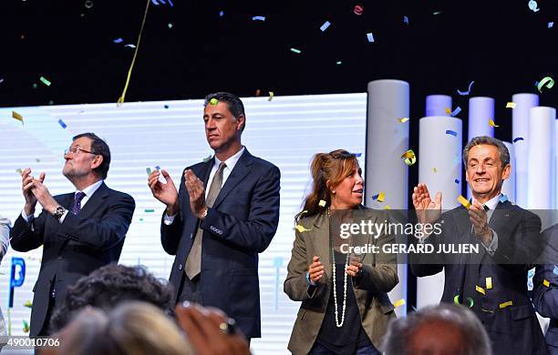Spanish Prime Minister Mariano Rajoy, candidate of Catalonia's Popular Party Xavier Garcia Albiol, Catalonia's PP President, Alicia Sanchez Camacho...