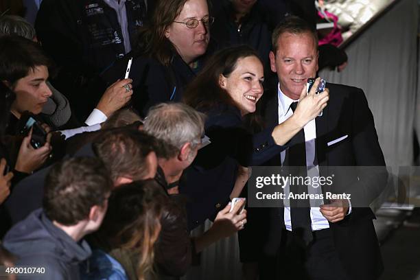 Actor Kiefer Sutherland takes a selfie with a fan at the 'Forsaken' Premiere during the Zurich Film Festival on September 25, 2015 in Zurich,...