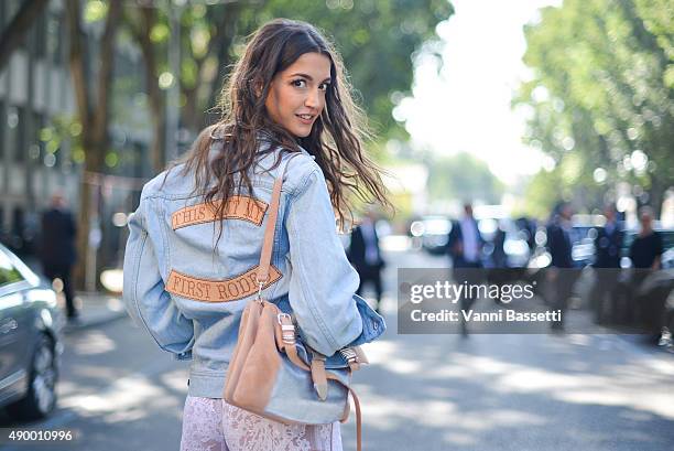 Sara Nicole Rossetto poses wearing an Understated Leather jacket and Barbara Bonner bag before the Emporio Armani show during the Milan Fashion Week...