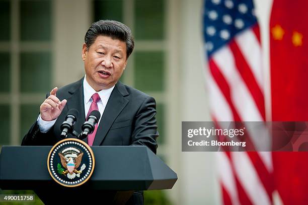 Xi Jinping, China's president, speaks during a during a joint news conference with U.S. President Barack Obama, not pictured, in the Rose Garden at...