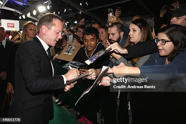 Actor Kiefer Sutherland signs autographs at the 'Forsaken' Premiere during the Zurich Film Festival on September 25, 2015 in Zurich, Switzerland. The...