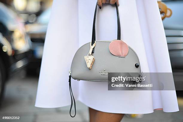 Dila Tarkan poses wearing a Sportmax skirt and a Kate Spade bag after the Sportmax showduring the Milan Fashion Week Spring/Summer 16 on September...