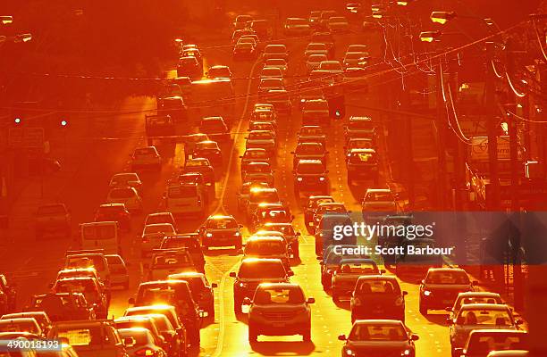 Rush hour traffic on a congested road as the sun sets on May 13, 2014 in Melbourne, Australia. Tony Abbott's Coalition government will deliver it's...