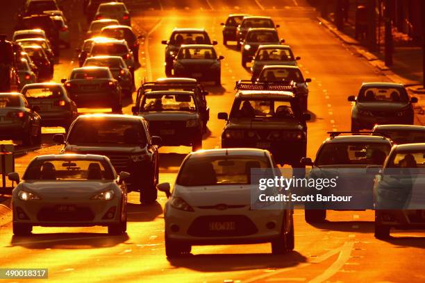 Rush hour traffic on a congested road as the sun sets on May 13, 2014 in Melbourne, Australia. Tony Abbott's Coalition government will deliver it's...