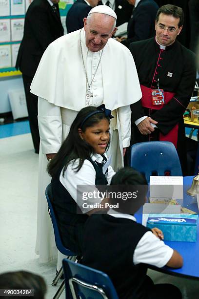 Pope Francis visits Our Lady Queen of Angels School September 21, 2015 in the East Harlem neighborhood of New York City. The pope is in New York on a...