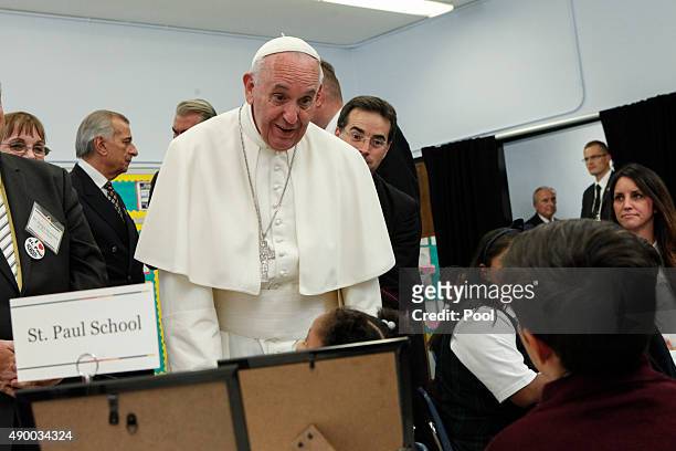 Pope Francis visits Our Lady Queen of Angels School September 21, 2015 in the East Harlem neighborhood of New York City. The pope is in New York on a...