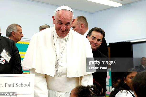 Pope Francis visits Our Lady Queen of Angels school September 21, 2015 in the East Harlem neighborhood of New York City. The pope is in New York on a...