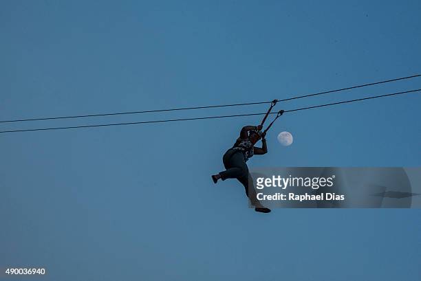 Fans enjoying the zip-line at day 05 of 2015 Rock in Rio on September 25, 2015 in Rio de Janeiro, Brazil.