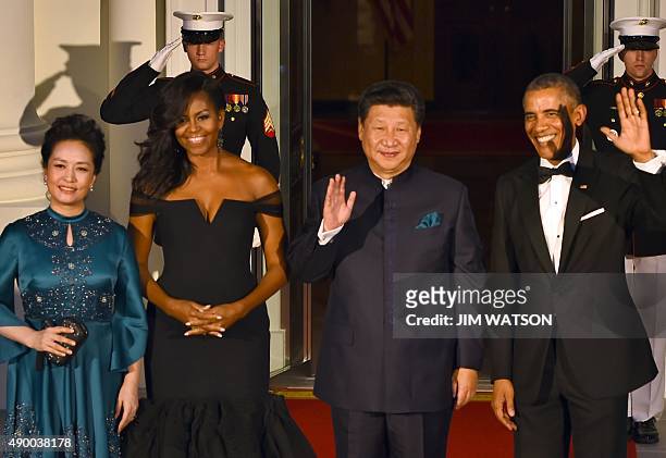 President Barack Obama and US First Lady Michelle welcome Chinese President Xi Jinping and his wife Peng Liyuan for a State Dinner at the White House...