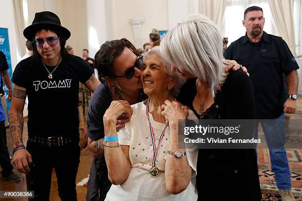 Tommy Henriksen and Johnny Depp from The Hollywood Vampires attend the Starkey Hearing Foundation event to support and benefit people in need at...