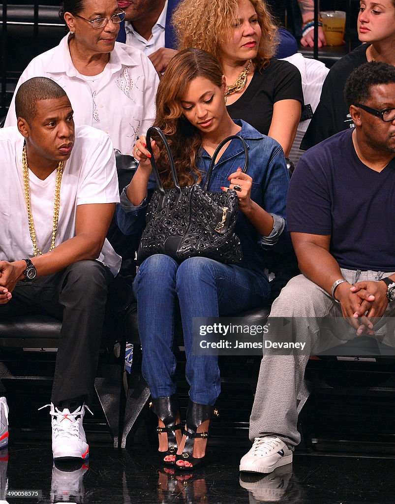 Celebrites Attend The Miami Heat Vs Brooklyn Nets Game - May 12, 2014