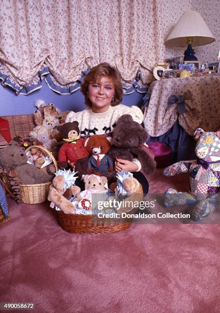 Actress Jill Whelan poses for a portrait session at homewith her stuffed animals in 1985 in Los Angeles, California.