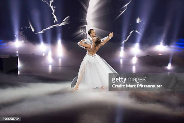 Joelina Drews and Marc Aurel Zeeb perform onstage during the third show of the television competition 'Stepping Out' at the Coloneum on September 25,...