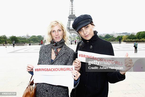 Sandrine Kiberlain and Ines de la Fressange participate to the demonstration in support for kidnapped Nigerian schoolgirls at the Trocadero on May...