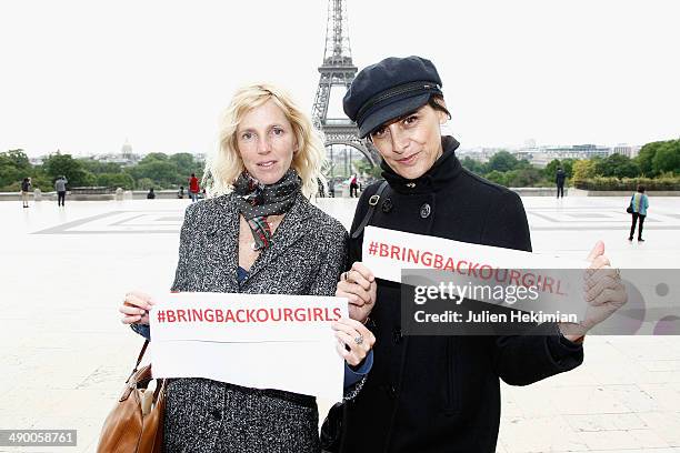 Sandrine Kiberlain and Ines de la Fressange participate to the demonstration in support for kidnapped Nigerian schoolgirls at the Trocadero on May...