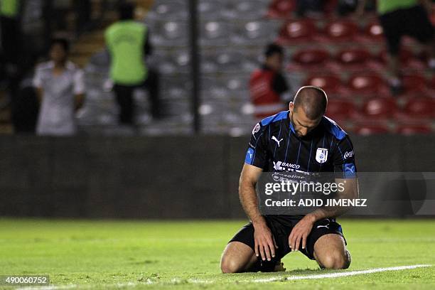 Emanuel Villa of Queretaro reacts in a match against Leon, during the Mexican Apertura 2015 tournament football match, at the La Corregidora stadium,...