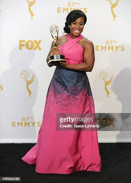 Actress Uzo Aduba poses in the press room at the 67th annual Primetime Emmy Awards at Microsoft Theater on September 20, 2015 in Los Angeles,...