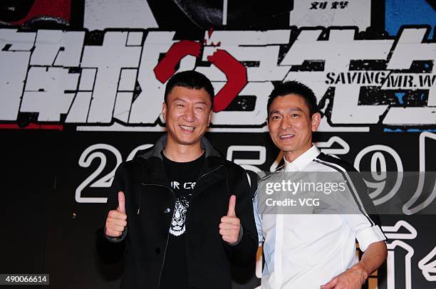 Singer and actor Andy Lau and actor Sun Honglei promote the new film "Saving Mr.Wu" on September 25, 2015 in Shanghai, China.