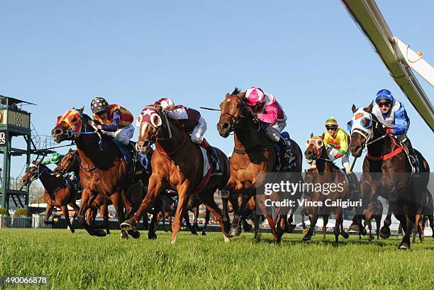 Craig Williams riding Stratum Star defeats Damien Oliver riding Disposition and Mark Zahra riding Under The Louvre in Race 8, the Sir Rupert Clarke...