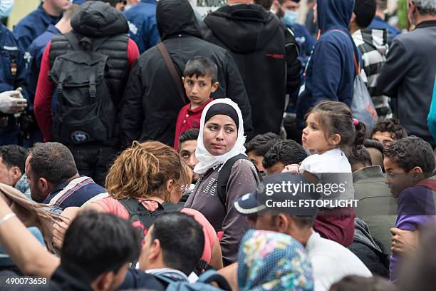 refugees in the keleti train station structure of budapest city - asylum seekers stock pictures, royalty-free photos & images