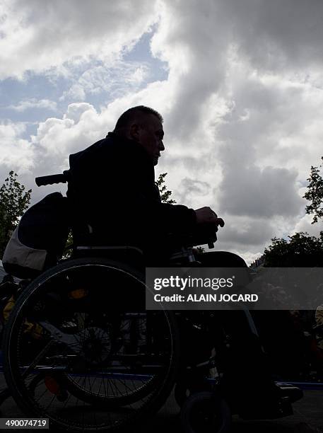 Disabled man in a wheelchair takes part in a demonstration called by the Paralysed Association of France to demand more accessibility for disabled...