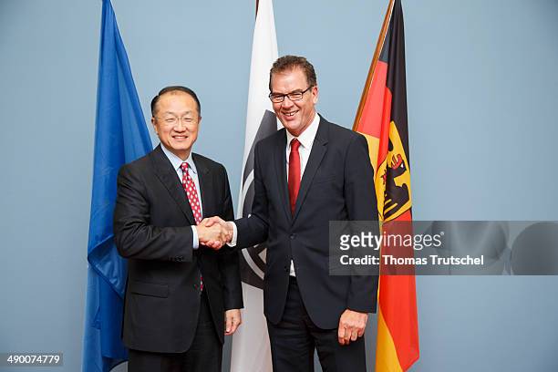 German Development Minister Gerd Mueller , meets with World Bank Group President Jim Yong Kim on May 13, 2014 in Berlin, Germany.