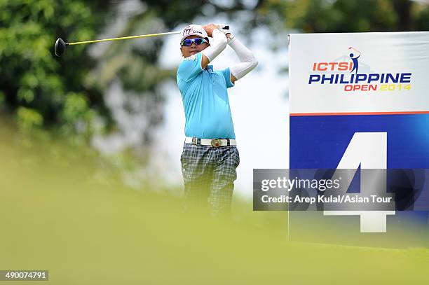 Lin Weng Tang of Chinese Taipei plays a shot during practice ahead of the ICTSI Philippine Open at Wack Wack Golf and Country Club on May 13, 2014 in...