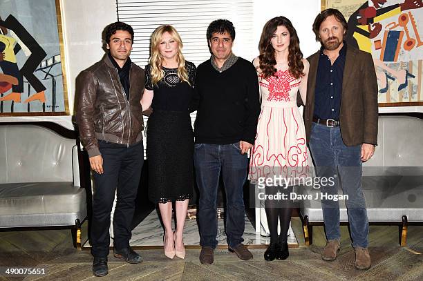 Hossein Amini, Kristen Dunst, Oscar Issac, Daisy Bevan and Viggo Mortensen attend a photocall for 'The Two Faces Of January' at The Corinthia Hotel...